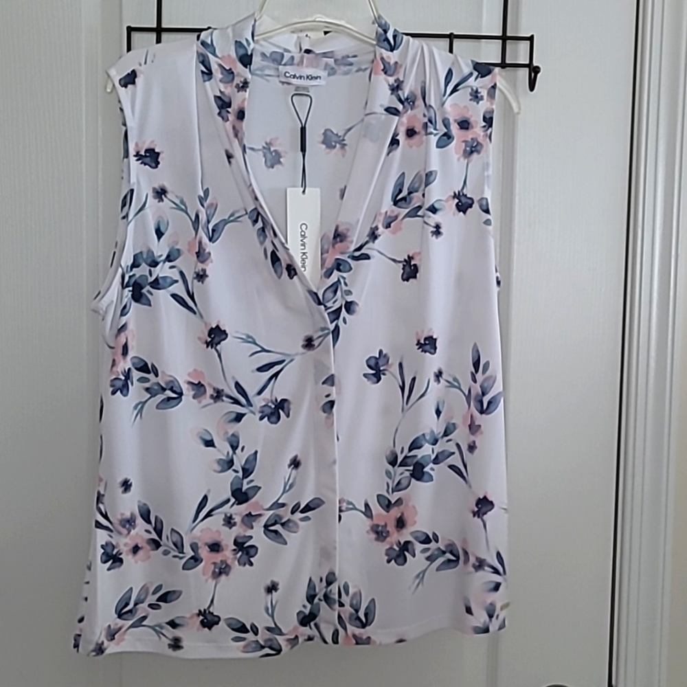 Calvin Klein XL sleeveless flowered blouse.